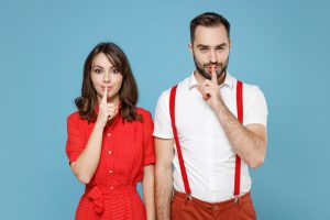 red and white male outfits with male and female
