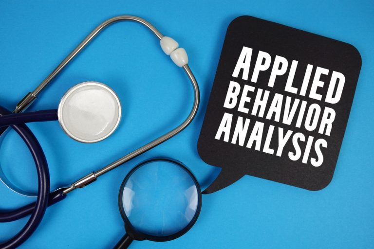 Applied behavior analysis (ABA therapy) on a blue background