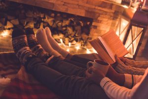 Couple reading a book and relaxing