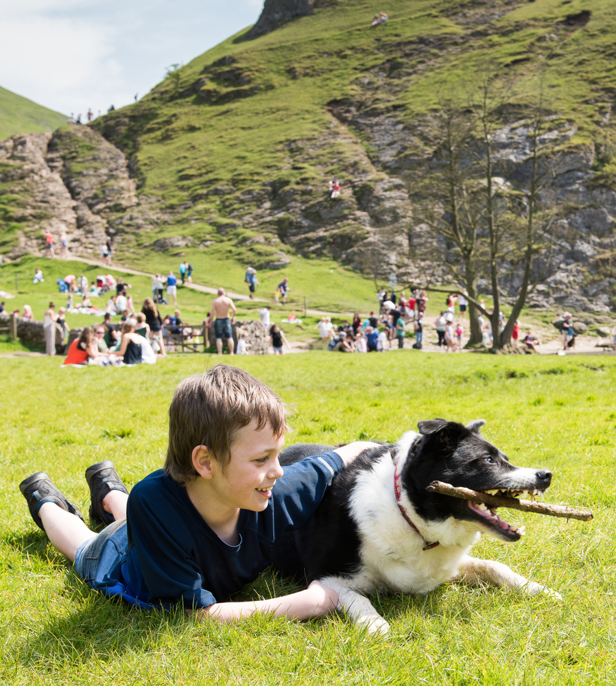 Boy with autism at the park with his dog