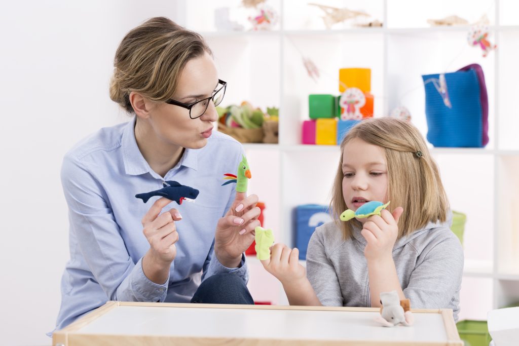 Therapist Using Toys to Teach Communication