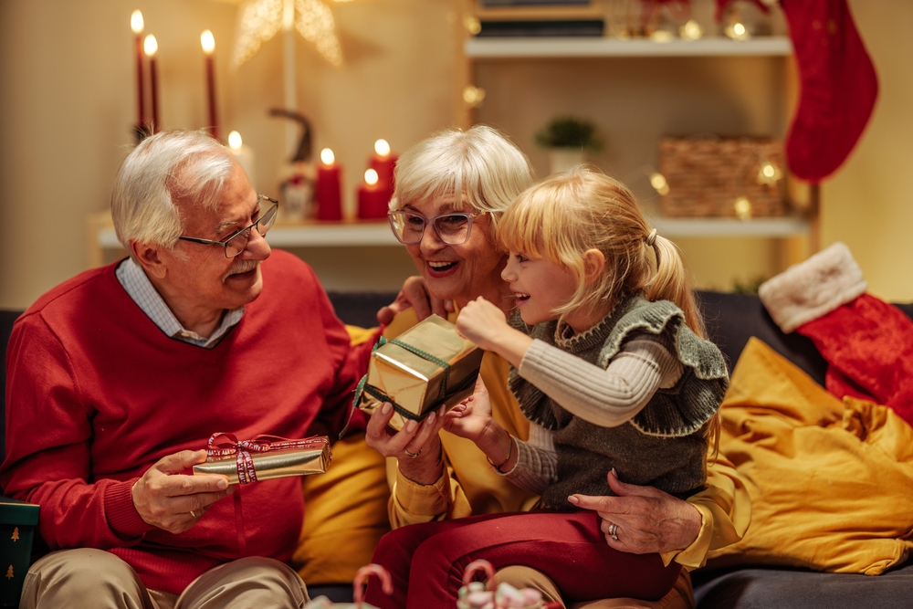 Child enjoying Christmas with relatives after ABA therapy