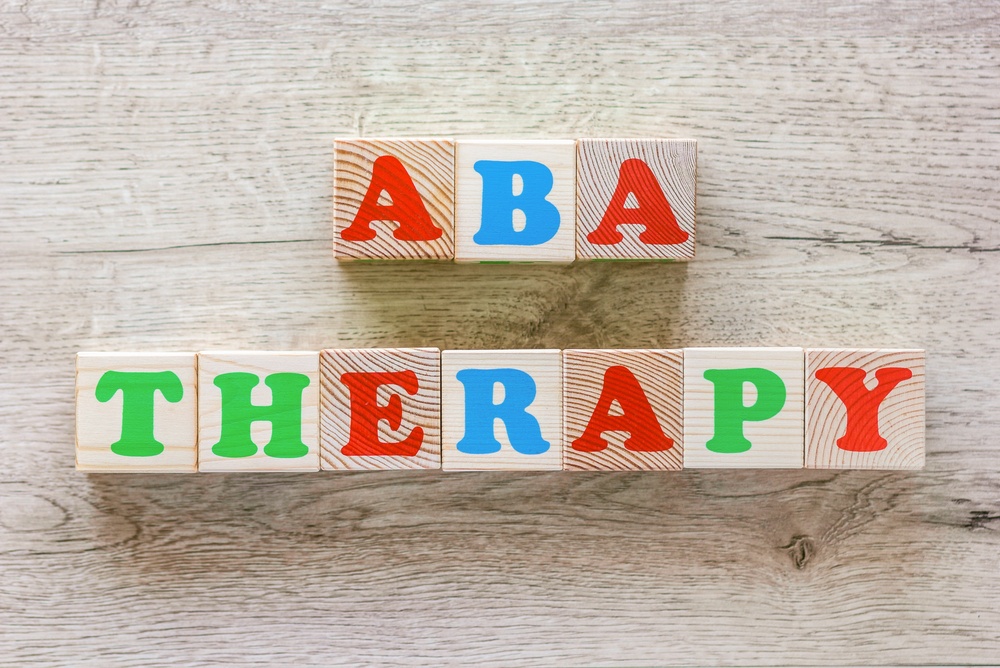 ABA therapy spelled out with blocks